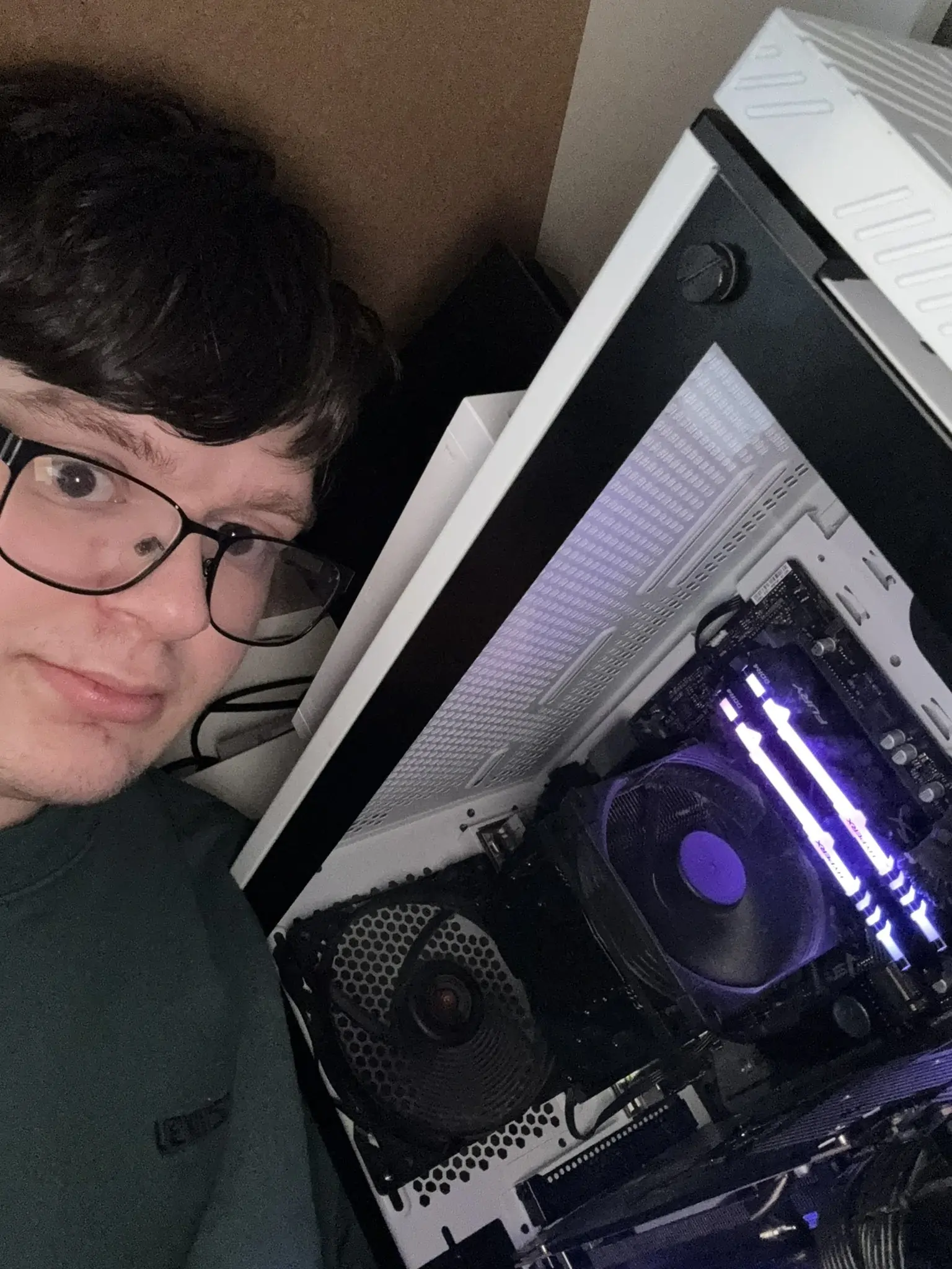 Me next to my desktop computer.